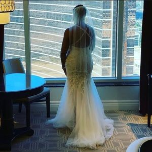 I have only worn this dress once, it was a size 16 and had it altered to fit.